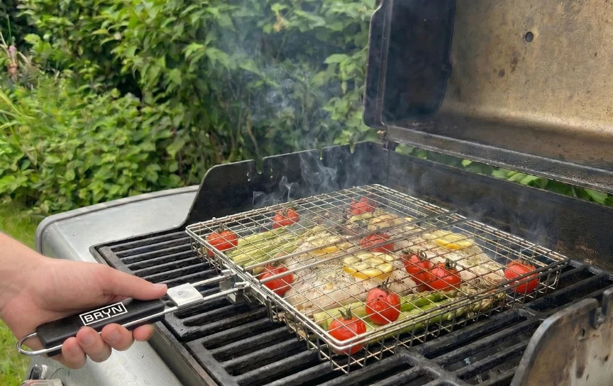 Plasserer grillkurven på grillen