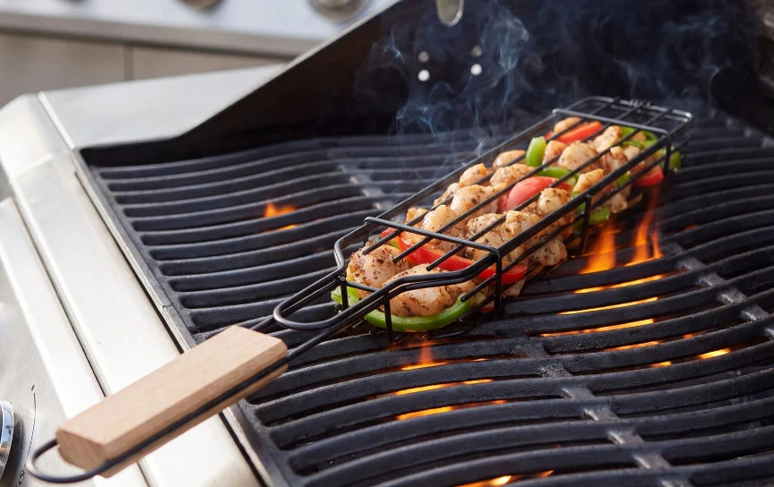 Plasserer grillkurven på grillen